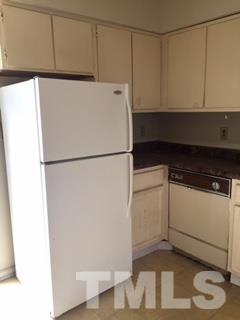 4541 Hargrove Road, Unit AD Raleigh, NC 27604 - Photo 8 of 22 a white refrigerator freezer sitting inside of a kitchen