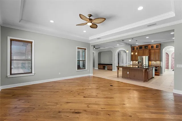 a view of room with wooden floor