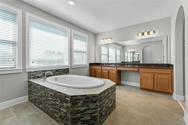 a view of an empty room with windows