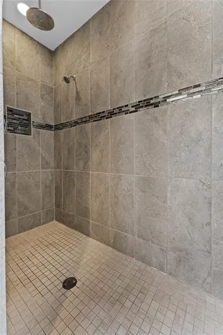 a view of an empty room with windows