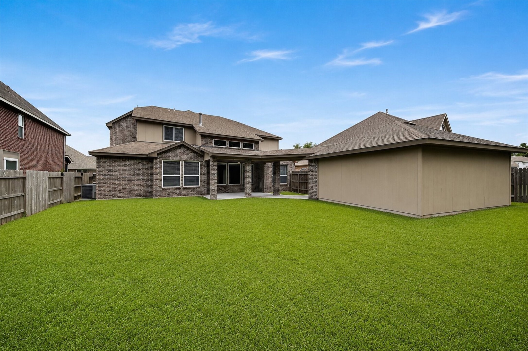 6234 Avon Landing Lane Spring, TX 77379 - Photo 4 of 49 The backyard is spacious and offers plenty of room for putting in a pool, or for children and pets to play safely in the fully fenced yard.