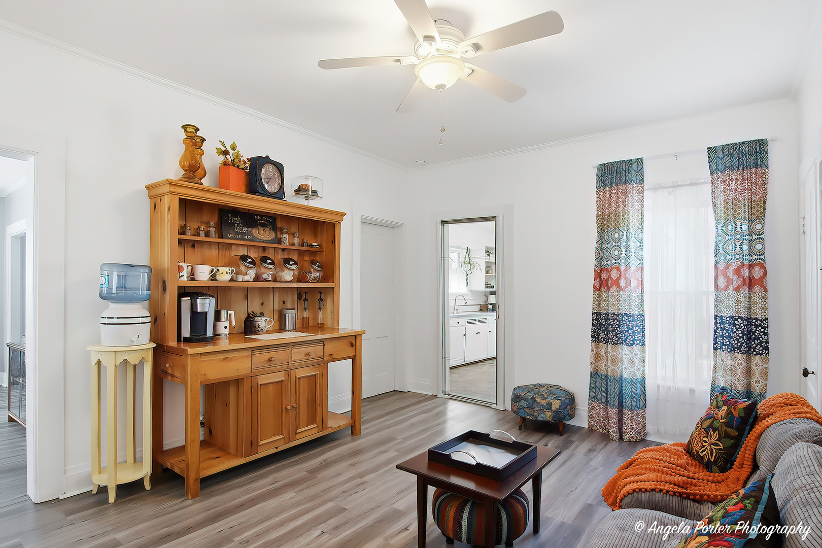 9703 Illinois Street Hebron, IL 60034 - Photo 15 of 30 a living room with furniture a bookshelf and a window