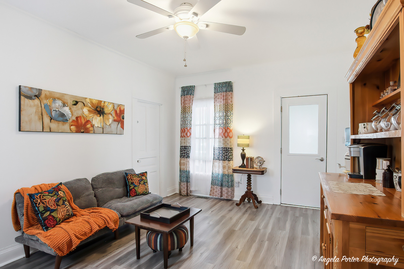 9703 Illinois Street Hebron, IL 60034 - Photo 16 of 30 a living room with furniture and a flat screen tv