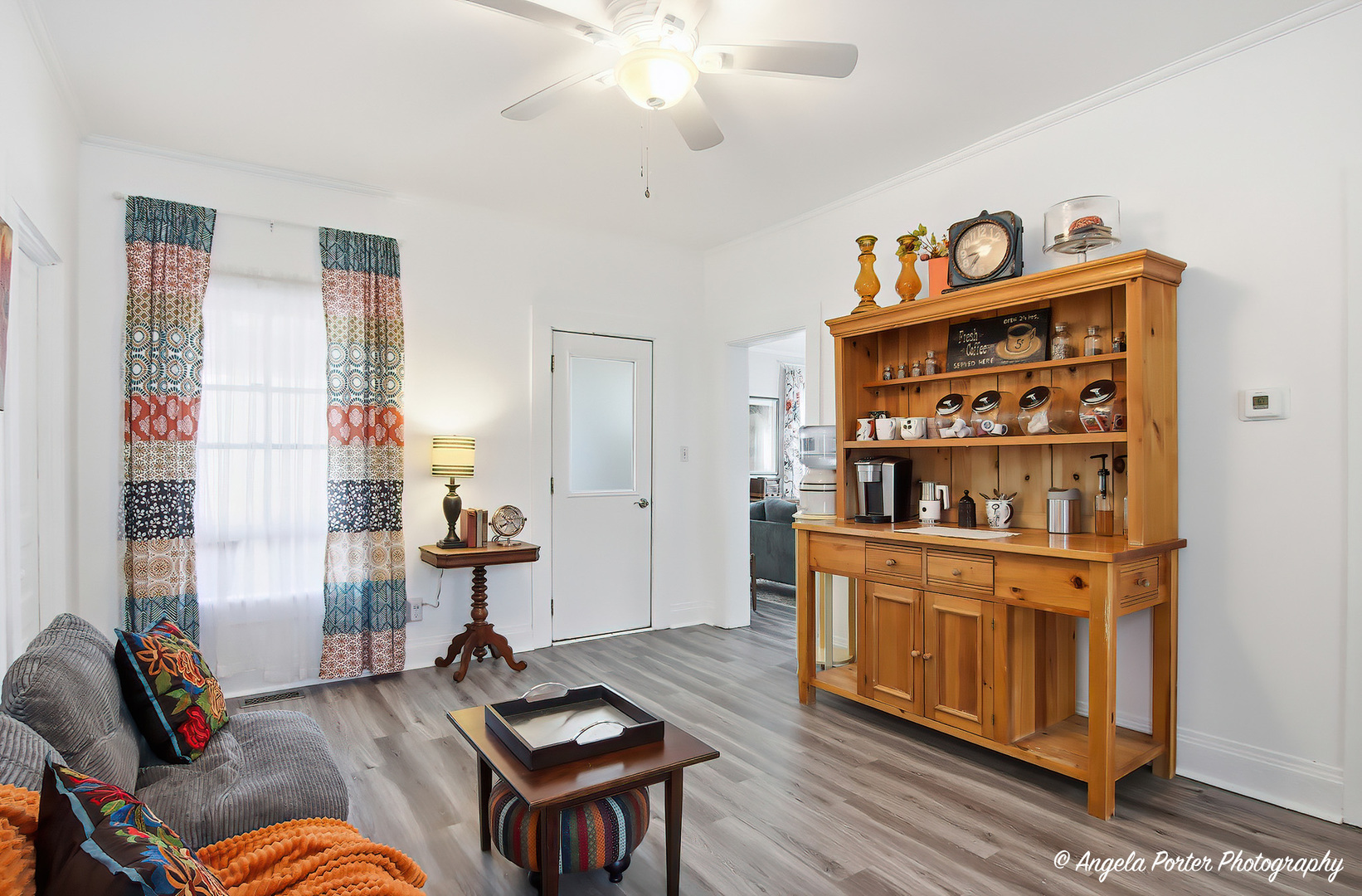 9703 Illinois Street Hebron, IL 60034 - Photo 17 of 30 a living room with furniture and a wooden floor