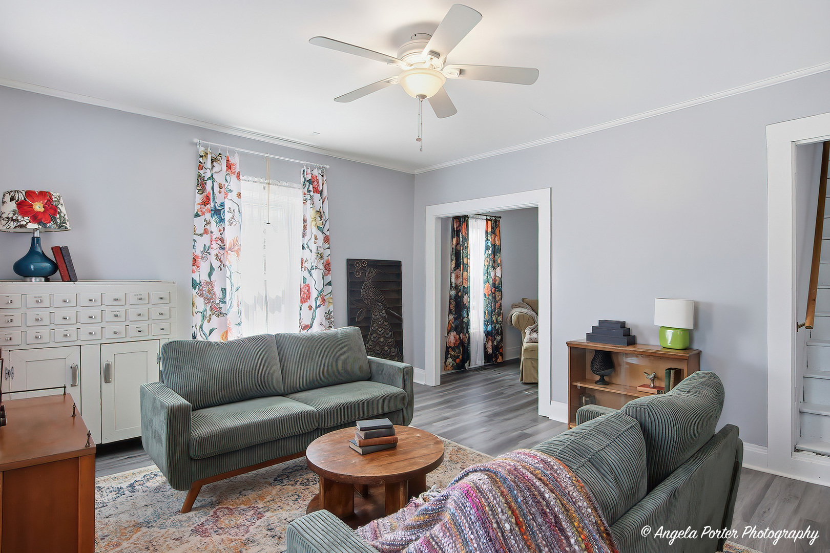 9703 Illinois Street Hebron, IL 60034 - Photo 20 of 30 a living room with furniture and a chandelier