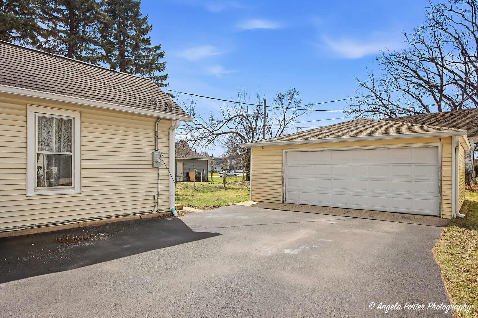 9703 Illinois Street Hebron, IL 60034 - Photo 2 of 30 a view of a house with a garage