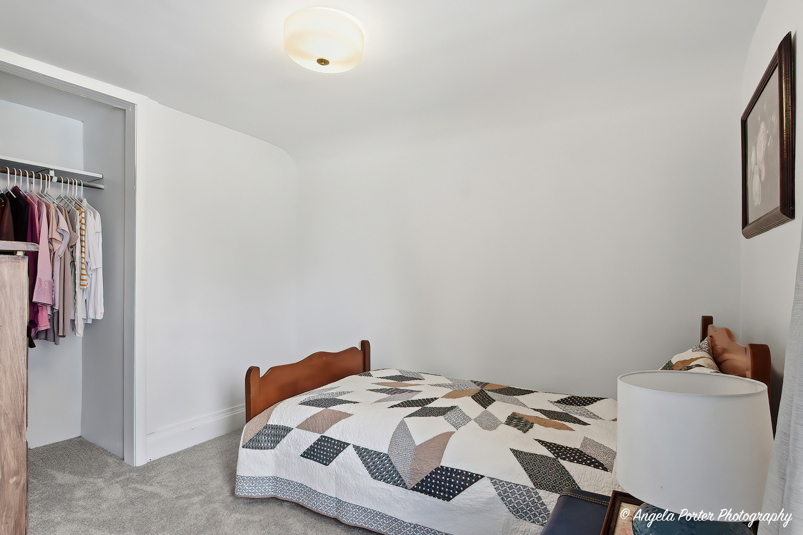 9703 Illinois Street Hebron, IL 60034 - Photo 24 of 30 a bedroom with a bed and a table in it