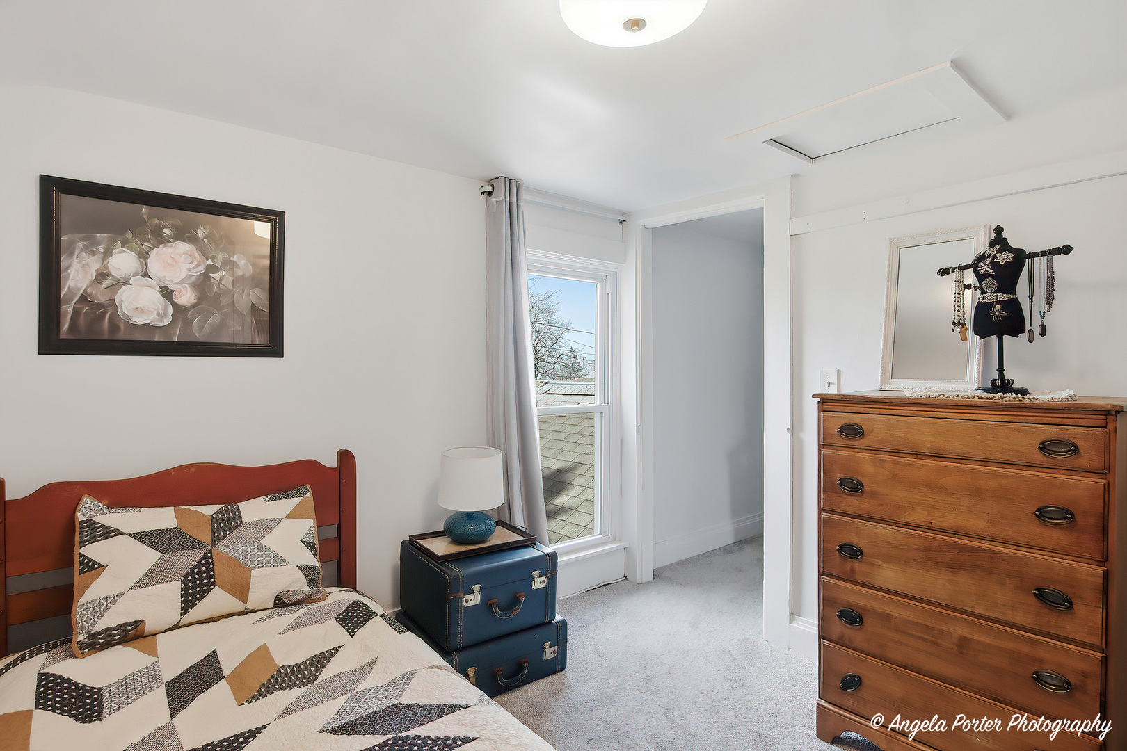 9703 Illinois Street Hebron, IL 60034 - Photo 25 of 30 a bedroom with a bed and a dresser