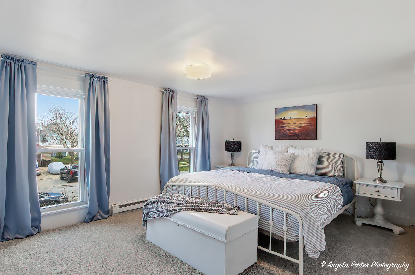 9703 Illinois Street Hebron, IL 60034 - Photo 26 of 30 a bedroom with a bed and a large window