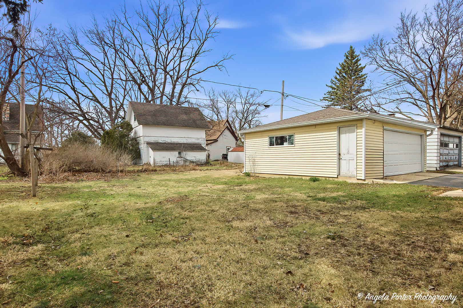 9703 Illinois Street Hebron, IL 60034 - Photo 28 of 30 a view of a backyard with large trees