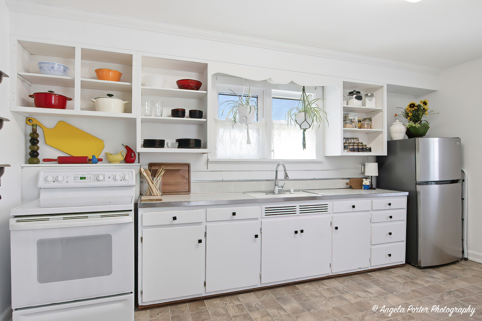 9703 Illinois Street Hebron, IL 60034 - Photo 4 of 30 a kitchen with cabinets appliances and wooden floor