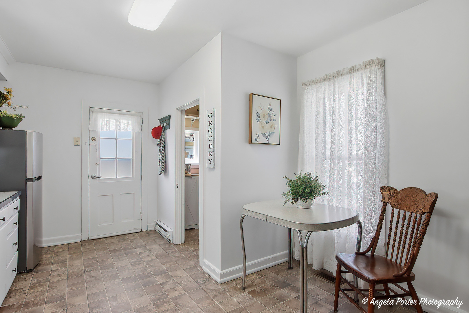 9703 Illinois Street Hebron, IL 60034 - Photo 5 of 30 a view of a dining room with furniture window and wooden floor
