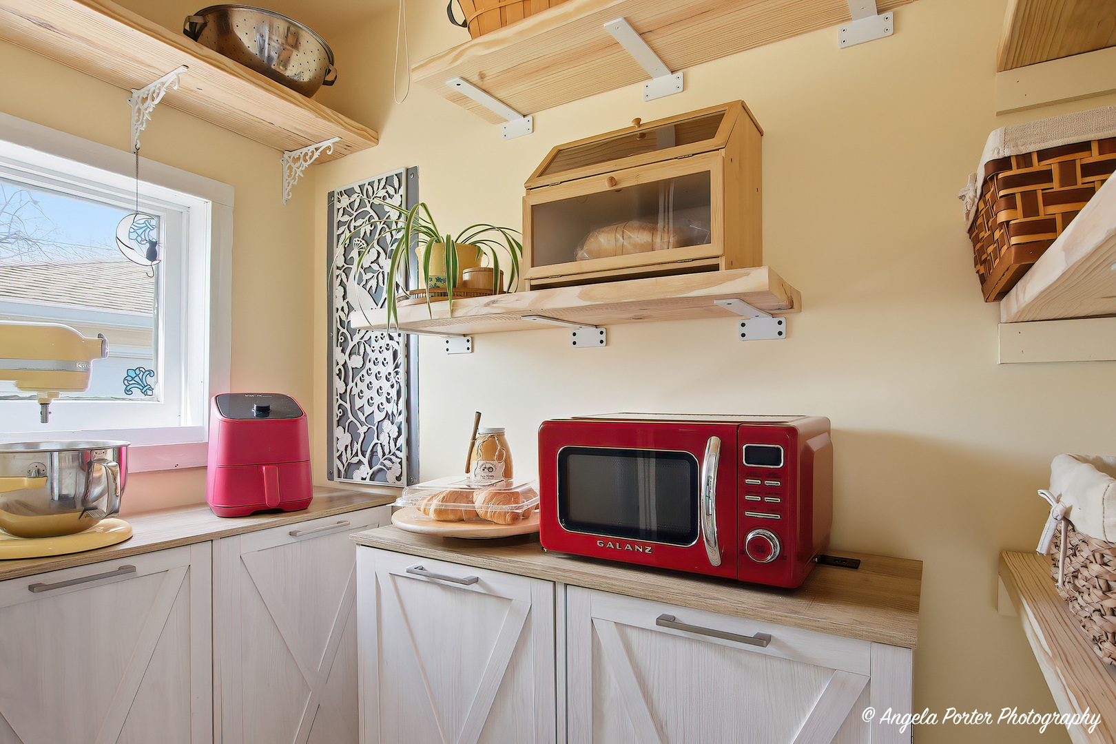 9703 Illinois Street Hebron, IL 60034 - Photo 7 of 30 a bathroom with a sink and a mirror