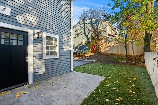 a backyard of a house with lots of green space