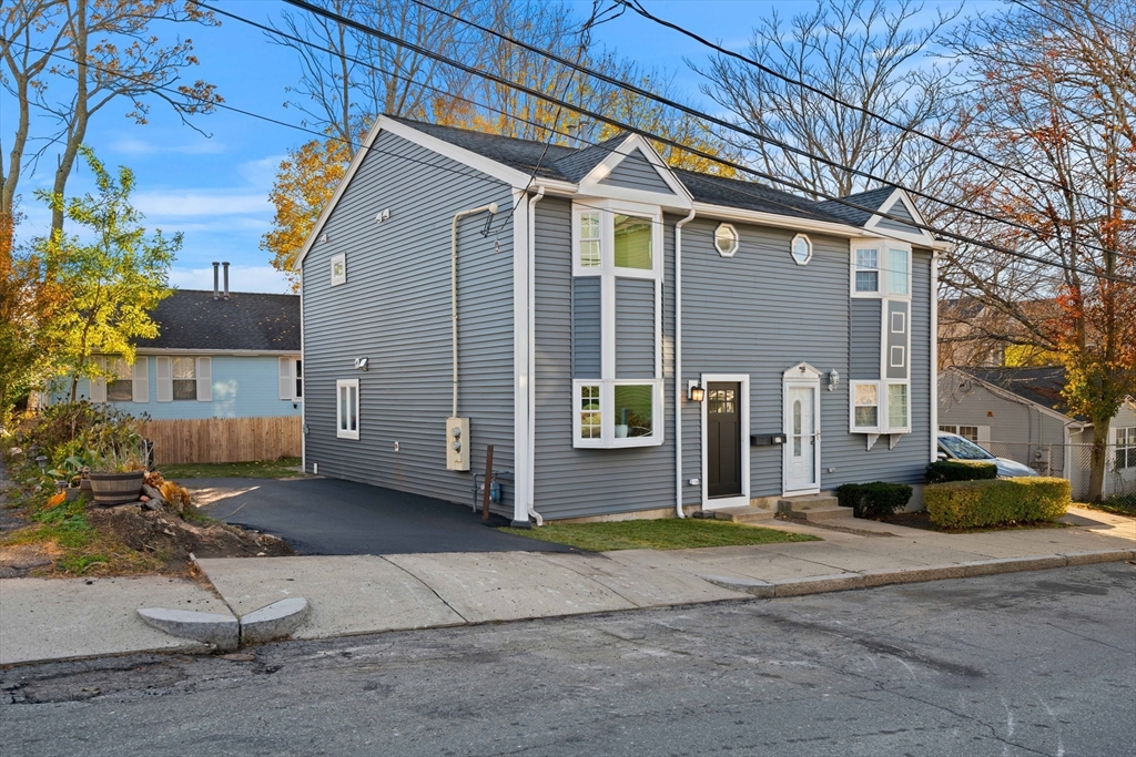 35 Dewey Street, Unit 35 Boston, MA 02125 - Photo 30 of 30 a view of a house with a patio