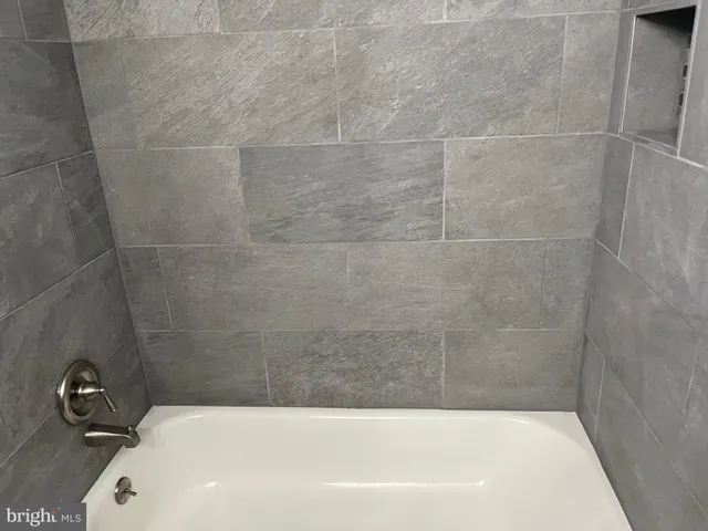 a bathroom with a tub
