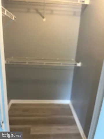 a view of small space with racks on the wall