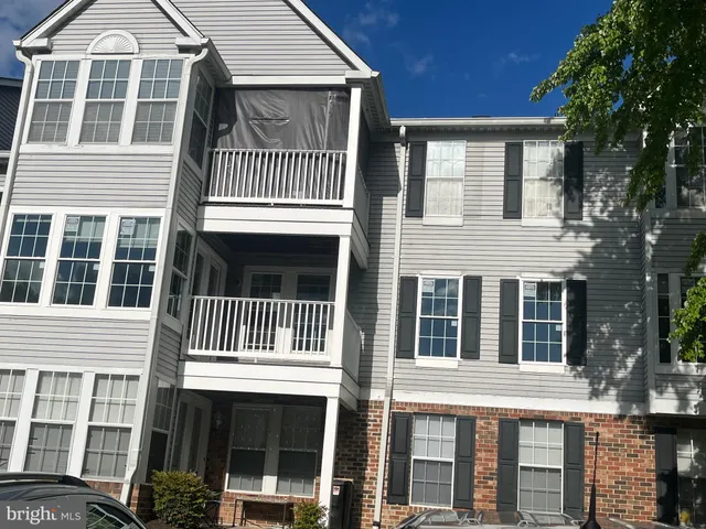 a front view of a house with a balcony
