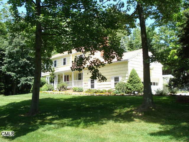 31 Wood Road Redding, CT 06896 - Photo 1 of 1 a front view of a house with garden