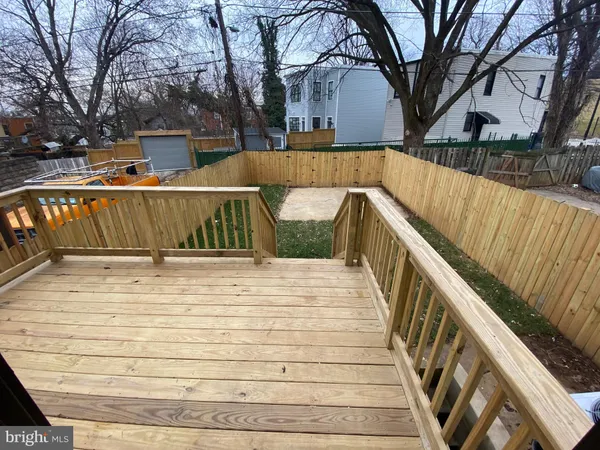 a view of outdoor space with swimming pool and deck