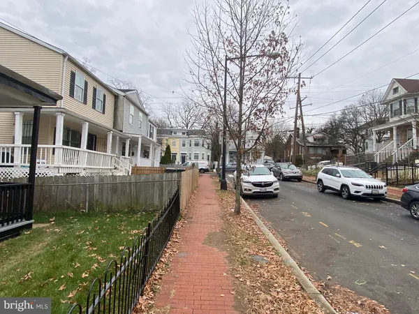 a view of a street with cars