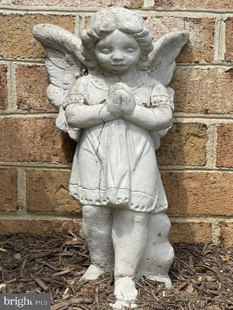 1016 Windrush Lane, Unit 25 Sandy Spring, MD 20860 - Photo 36 of 37 Charming cherub to bring good luck.