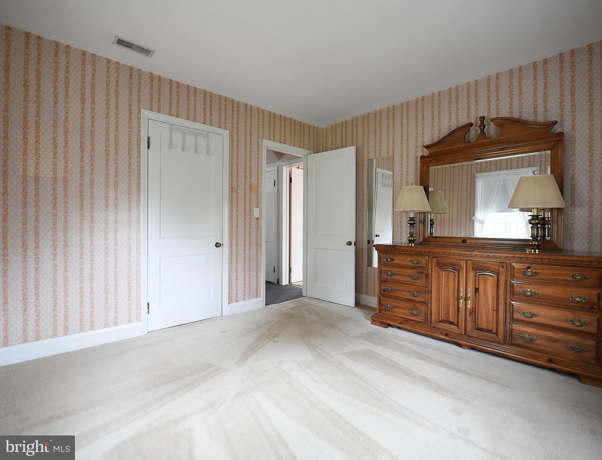 23 Mountain Road Fallston, MD 21047 - Photo 15 of 36 Main floor primary bedroom with wood under carpet