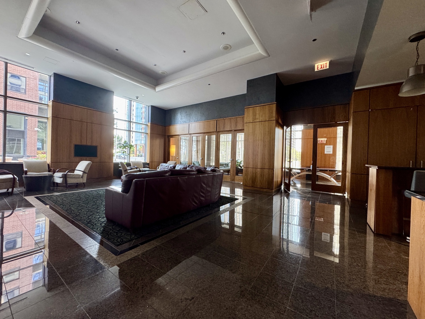 420 East Waterside Drive, Unit 4010 Chicago, IL 60601 - Photo 30 of 39 a living room with fireplace furniture and a large window
