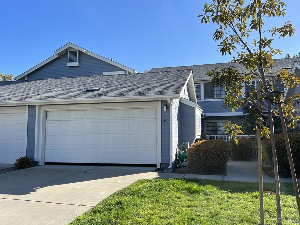 352 Windjammer Circle Chula Vista, CA 91910 - Photo 1 of 1 a front view of a house with garden