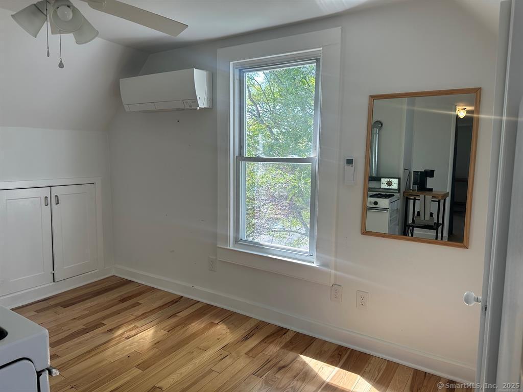 57 Dawson Avenue, Unit 4 West Haven, CT 06516 - Photo 4 of 11 a view of a storage and utility room with a window