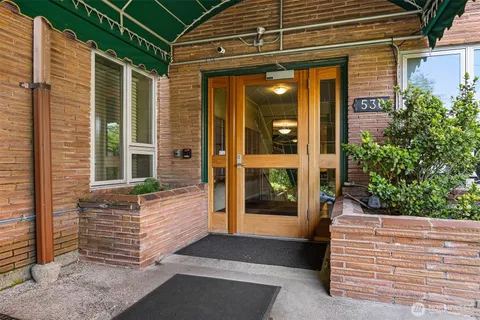 a front view of a house with a porch