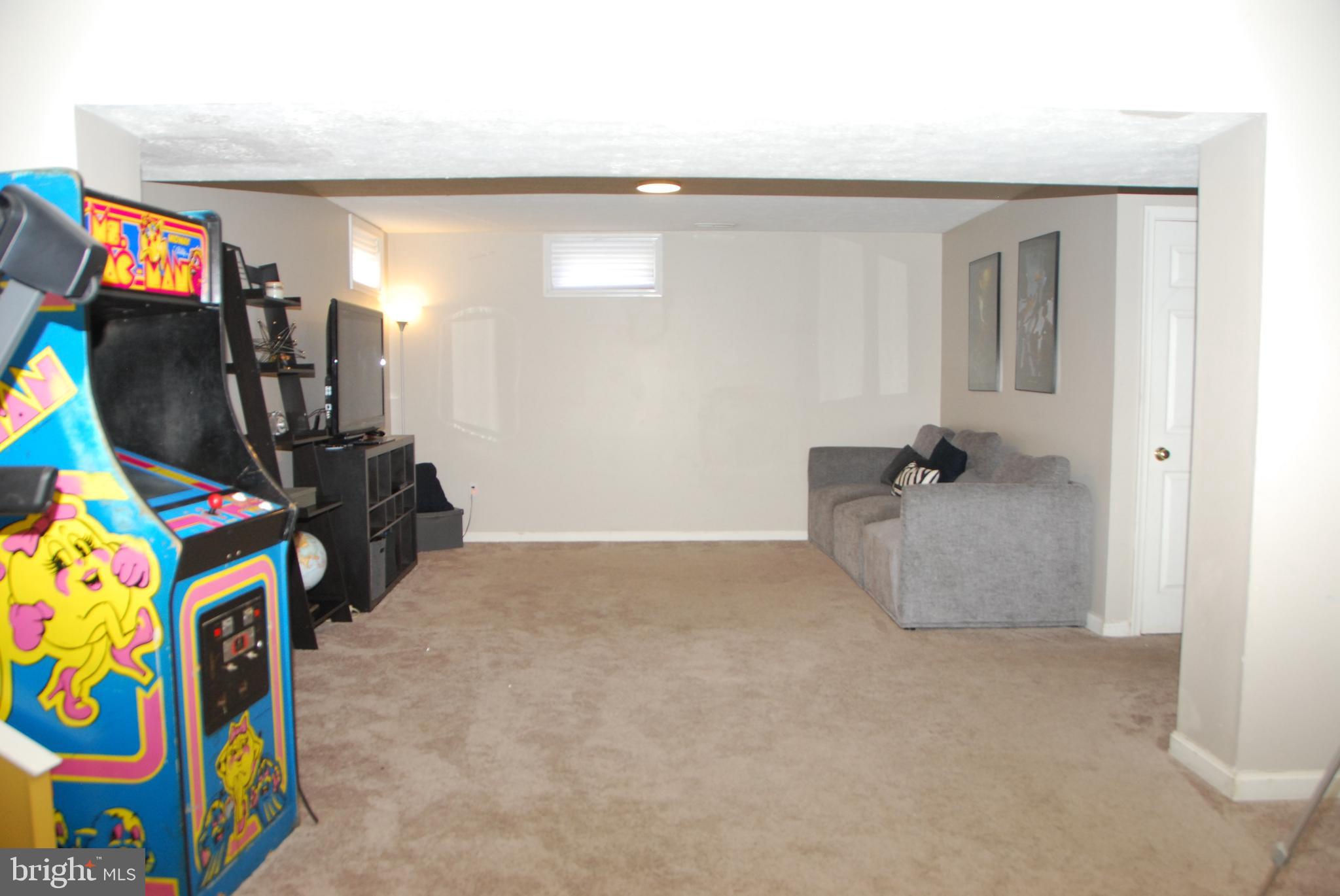 4605 Runnymeade Road Owings Mills, MD 21117 - Photo 22 of 43 Finished basement gaming area