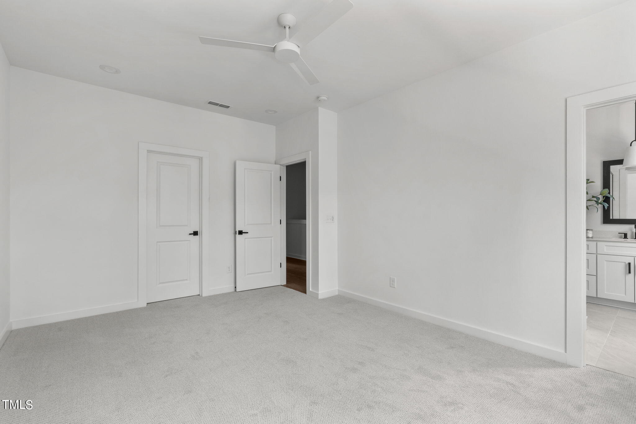 6424 Tanner Oak Lane Raleigh, NC 27613 - Photo 17 of 51 an empty room with closet