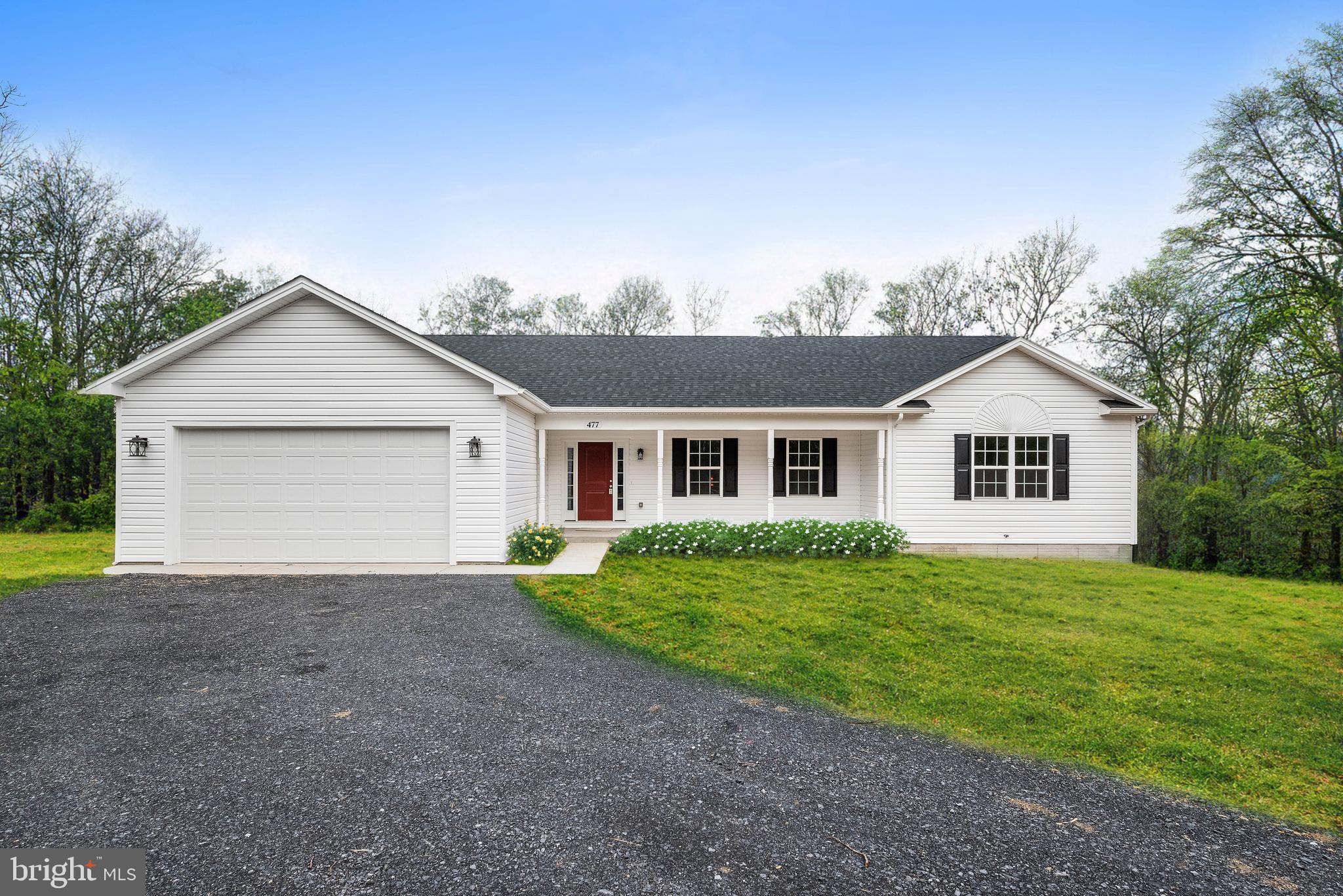 477 North Timber Ridge Road Cross Junction, VA 22625 - Photo 1 of 42 a front view of house with yard and green space