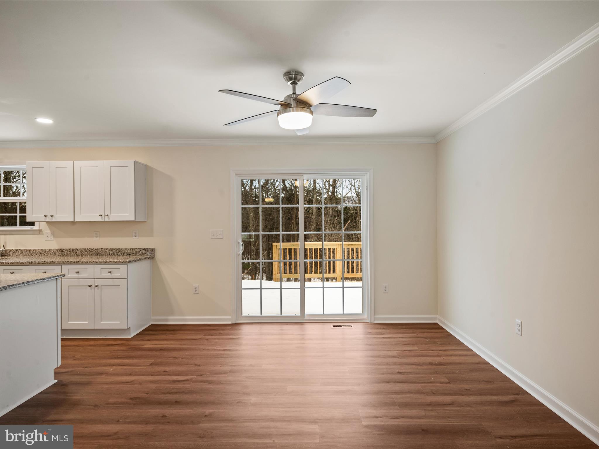 477 North Timber Ridge Road Cross Junction, VA 22625 - Photo 12 of 42 a view of an empty room with window and wooden floor