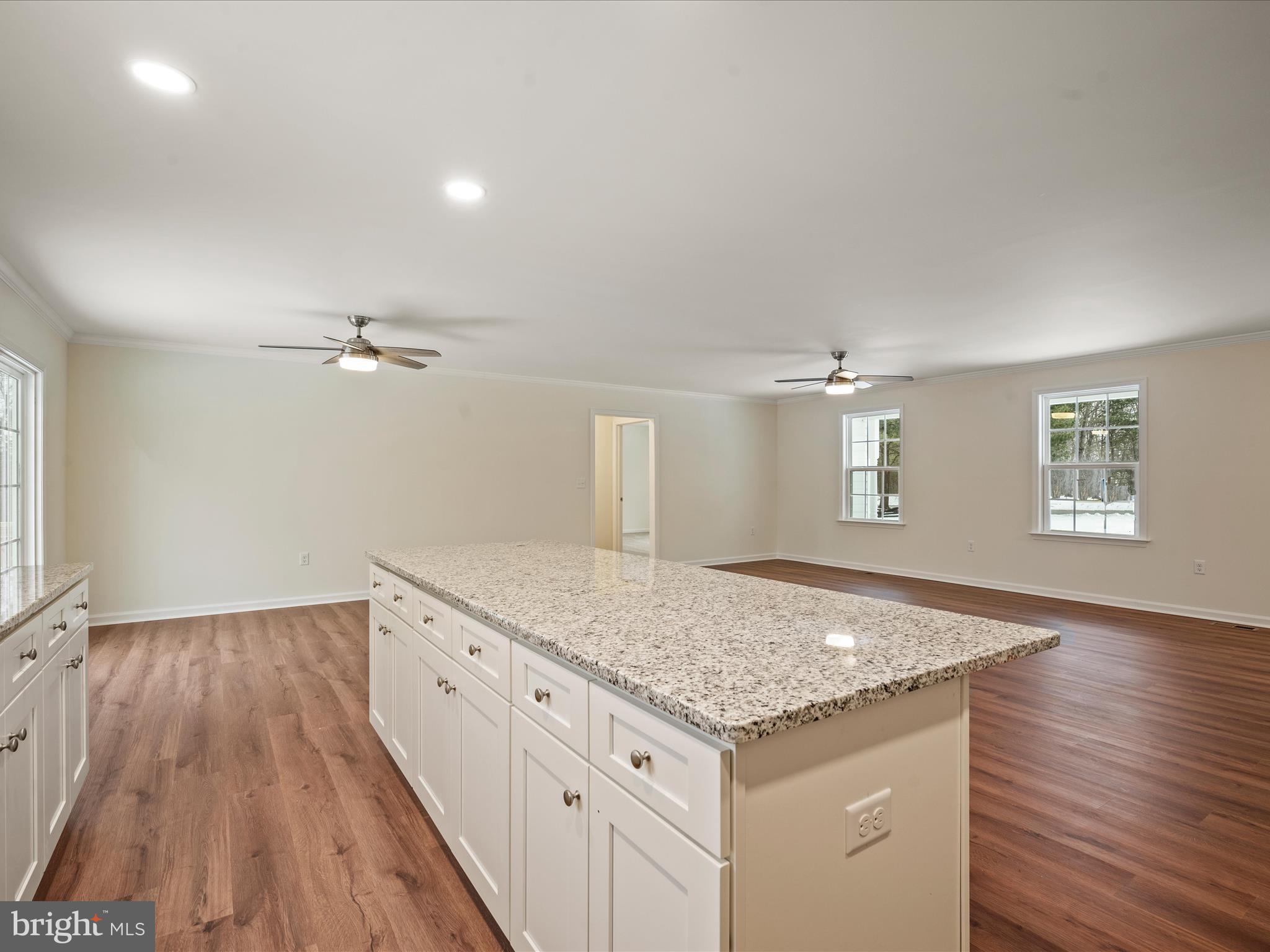477 North Timber Ridge Road Cross Junction, VA 22625 - Photo 13 of 42 wooden floor in an empty room with a window