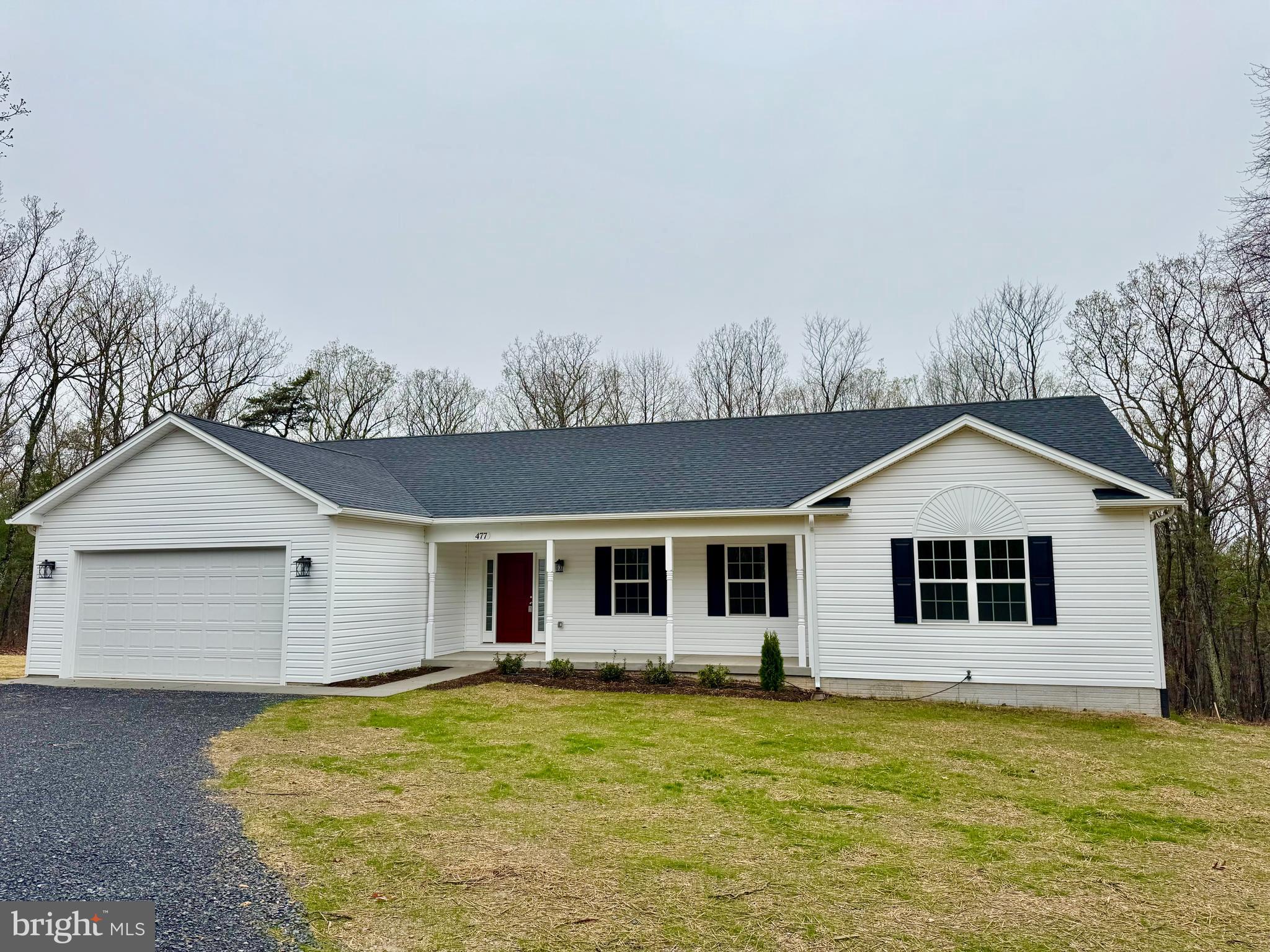 477 North Timber Ridge Road Cross Junction, VA 22625 - Photo 2 of 42 a front view of a house with a yard