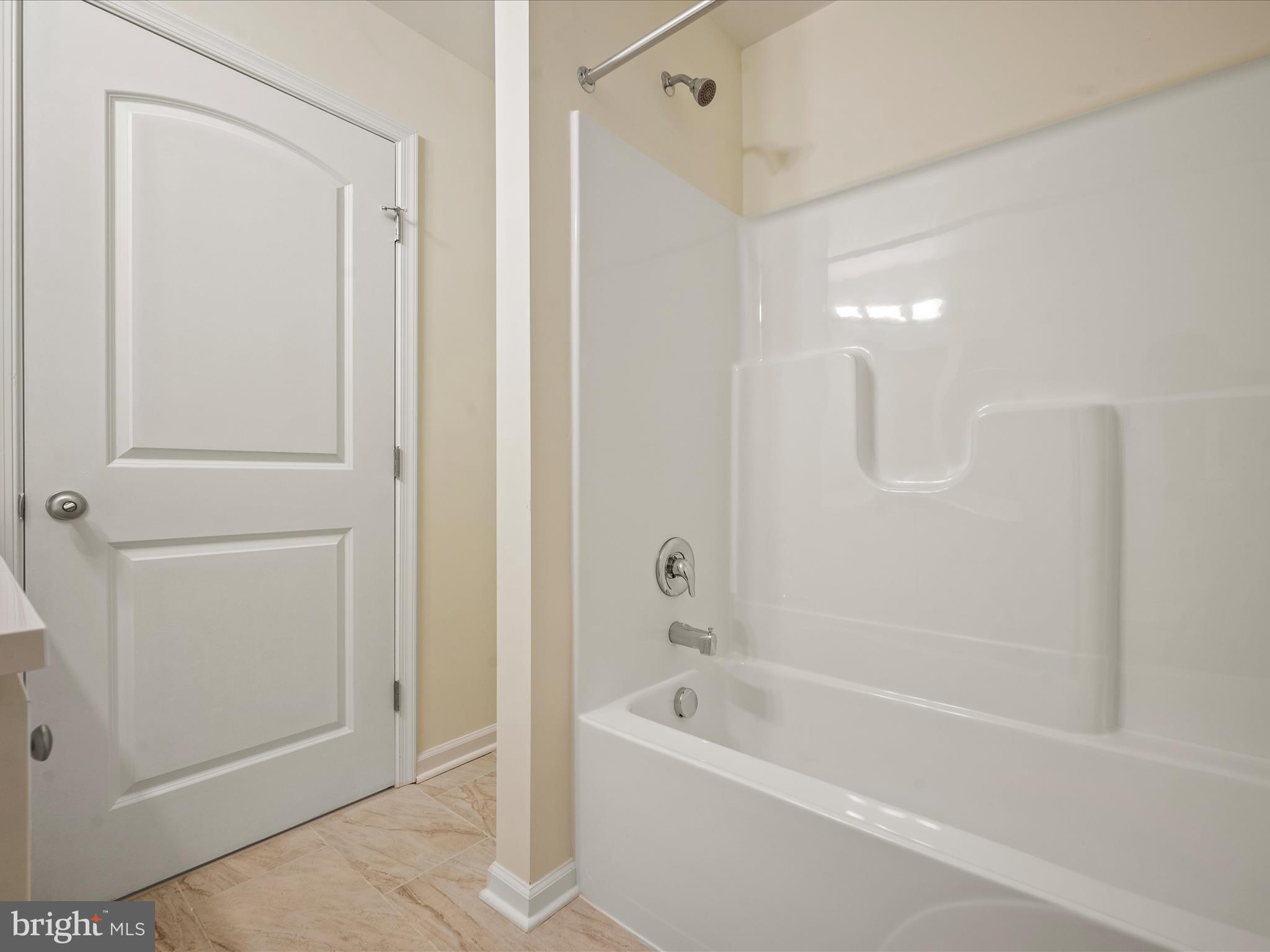 477 North Timber Ridge Road Cross Junction, VA 22625 - Photo 27 of 42 a white bath tub sitting next to a shower