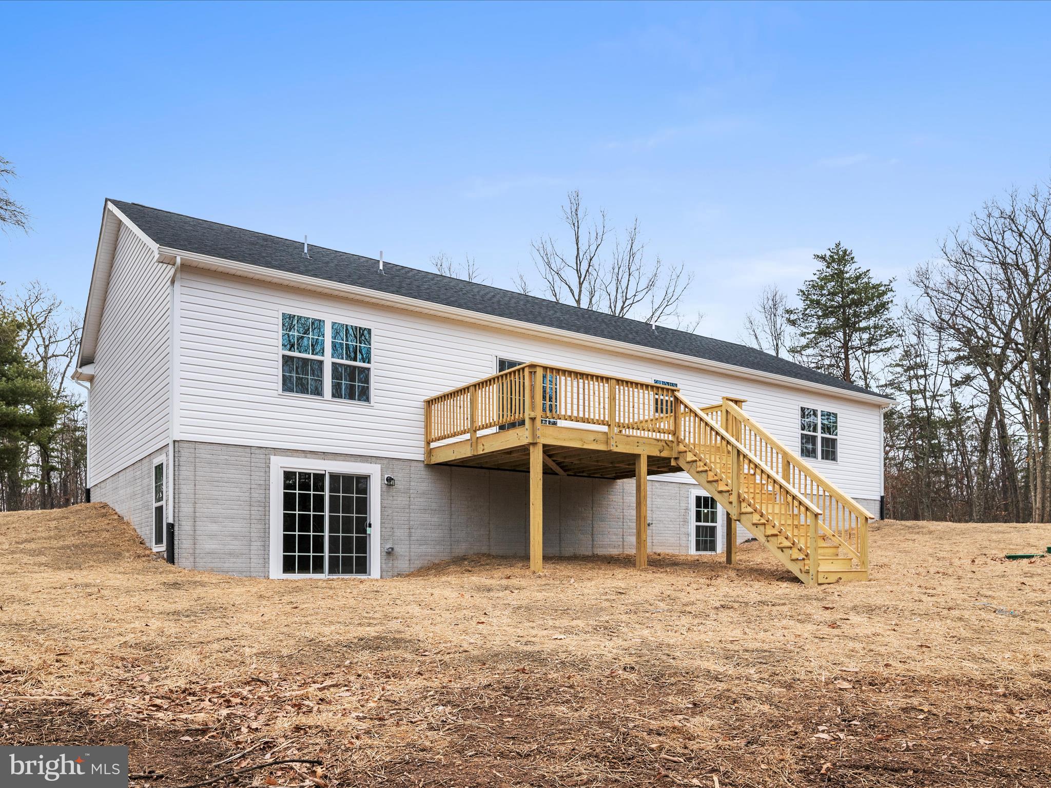 477 North Timber Ridge Road Cross Junction, VA 22625 - Photo 3 of 42 a front view of a house with a yard