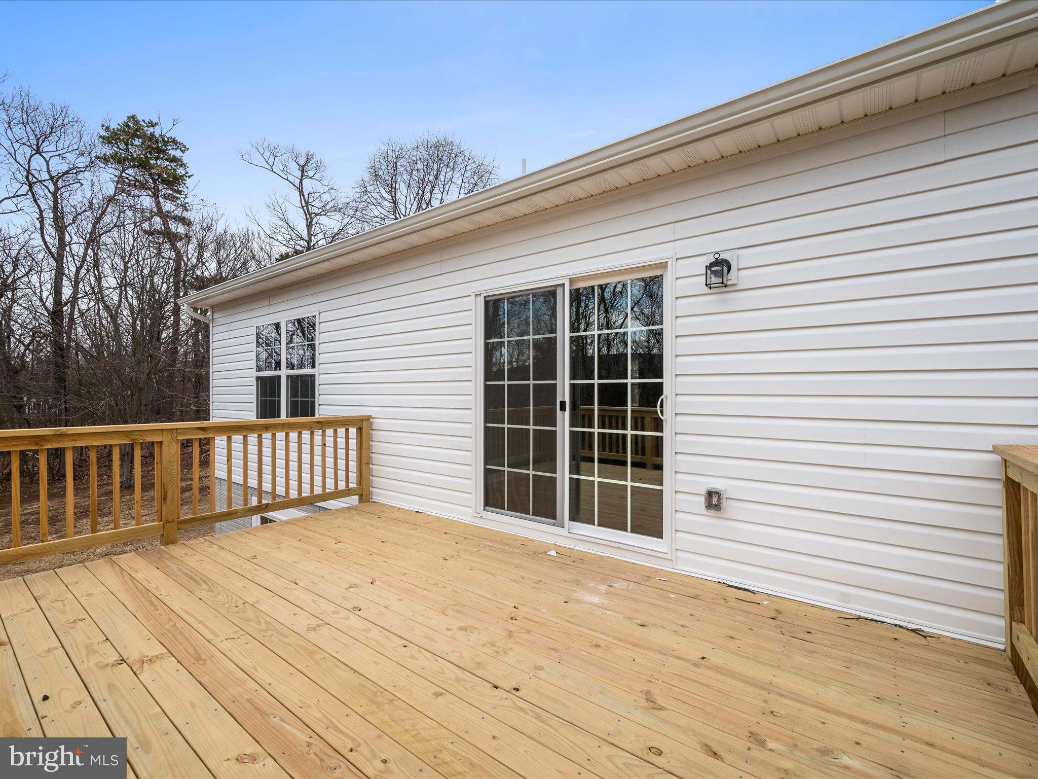 477 North Timber Ridge Road Cross Junction, VA 22625 - Photo 37 of 42 a view of a house with a balcony