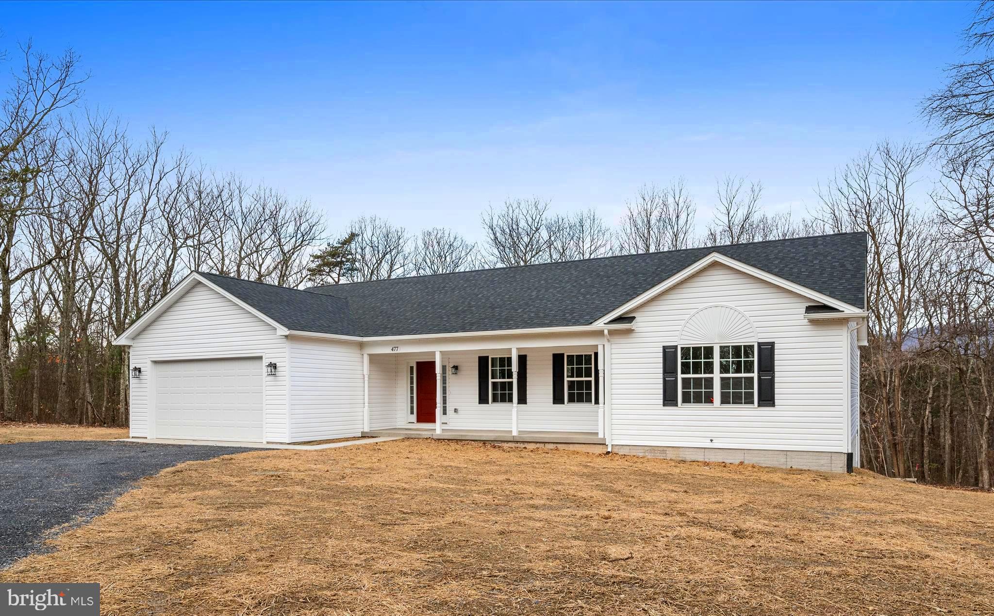 477 North Timber Ridge Road Cross Junction, VA 22625 - Photo 39 of 42 a front view of a house with a yard