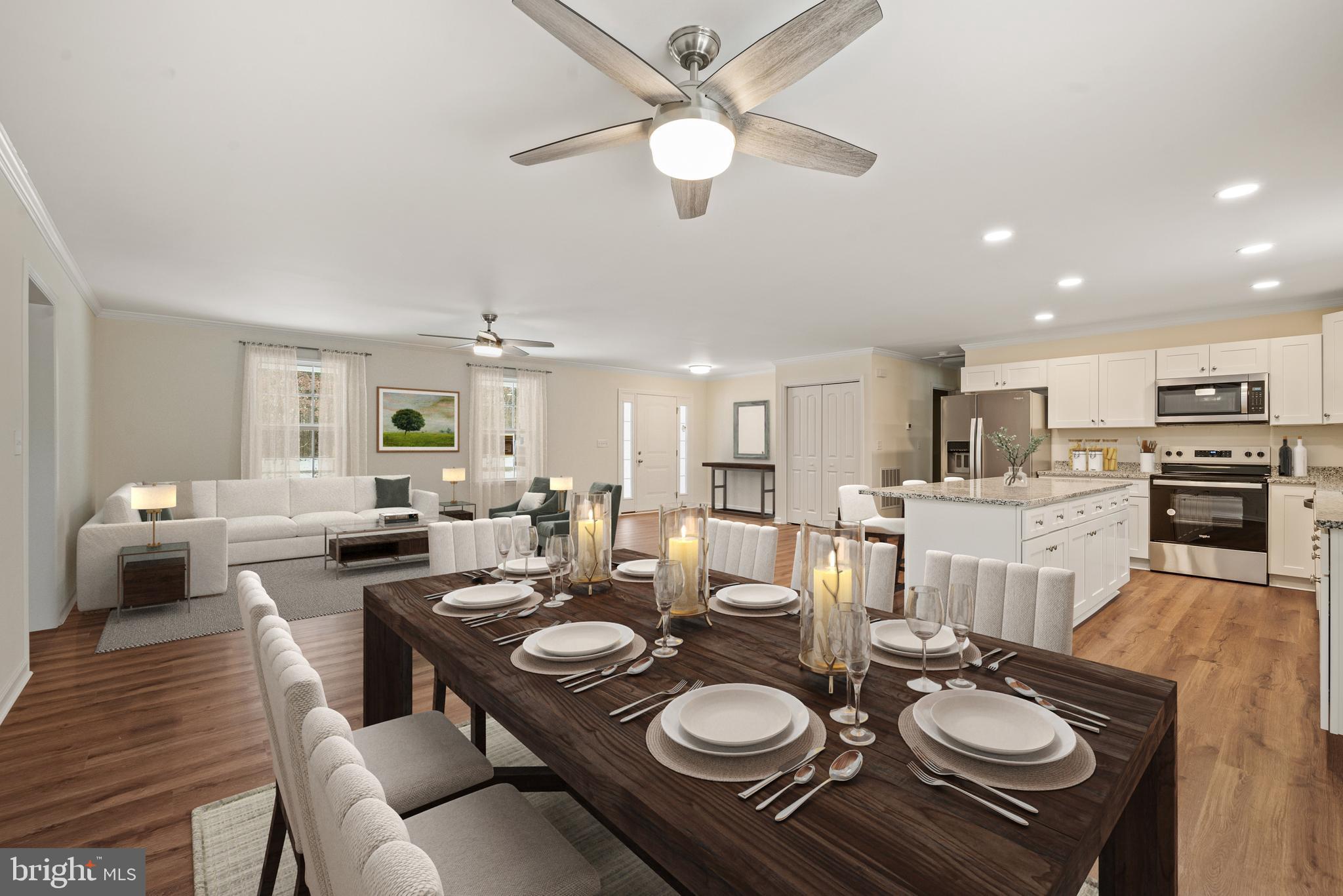 477 North Timber Ridge Road Cross Junction, VA 22625 - Photo 4 of 42 a dining room with furniture kitchen view and a chandelier