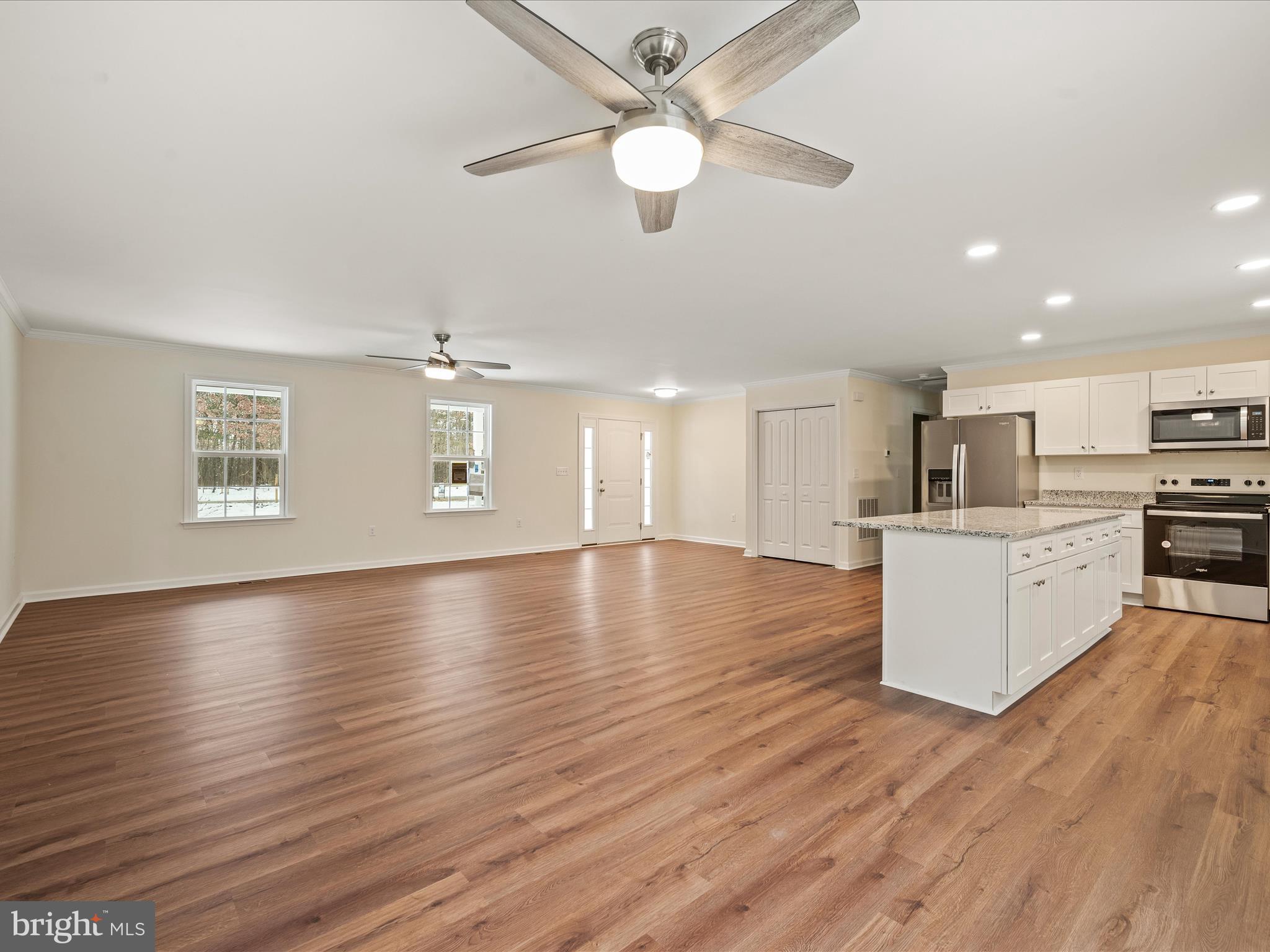 477 North Timber Ridge Road Cross Junction, VA 22625 - Photo 5 of 42 a view of kitchen and kitchen with stove top oven