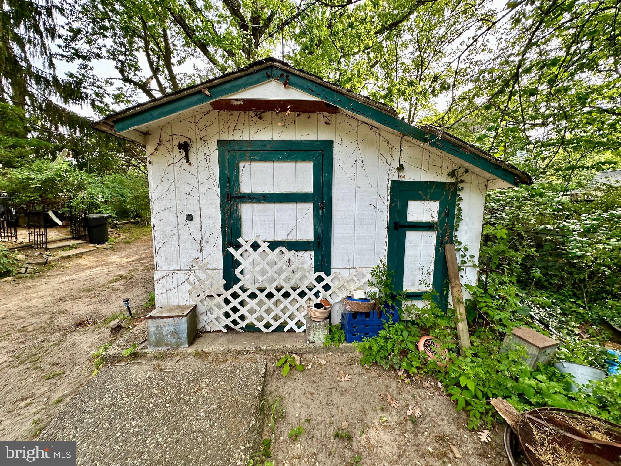 1604 Erial Road Pine Hill, NJ 08021 - Photo 7 of 15 a front view of a house with garden