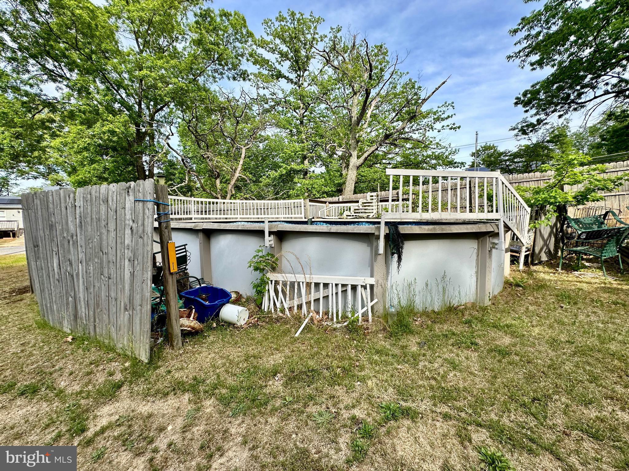 1604 Erial Road Pine Hill, NJ 08021 - Photo 10 of 15 a view of a chair and table in backyard