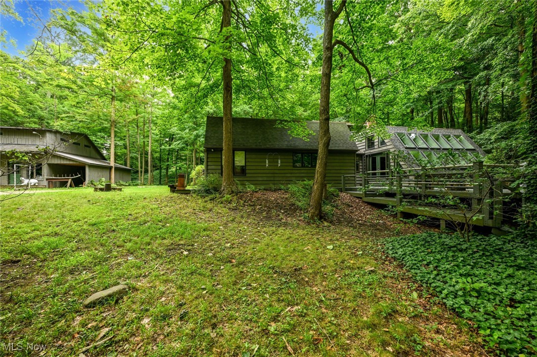 7061 Cascade Road Painesville, OH 44077 - Photo 46 of 49 View of yard featuring a deck