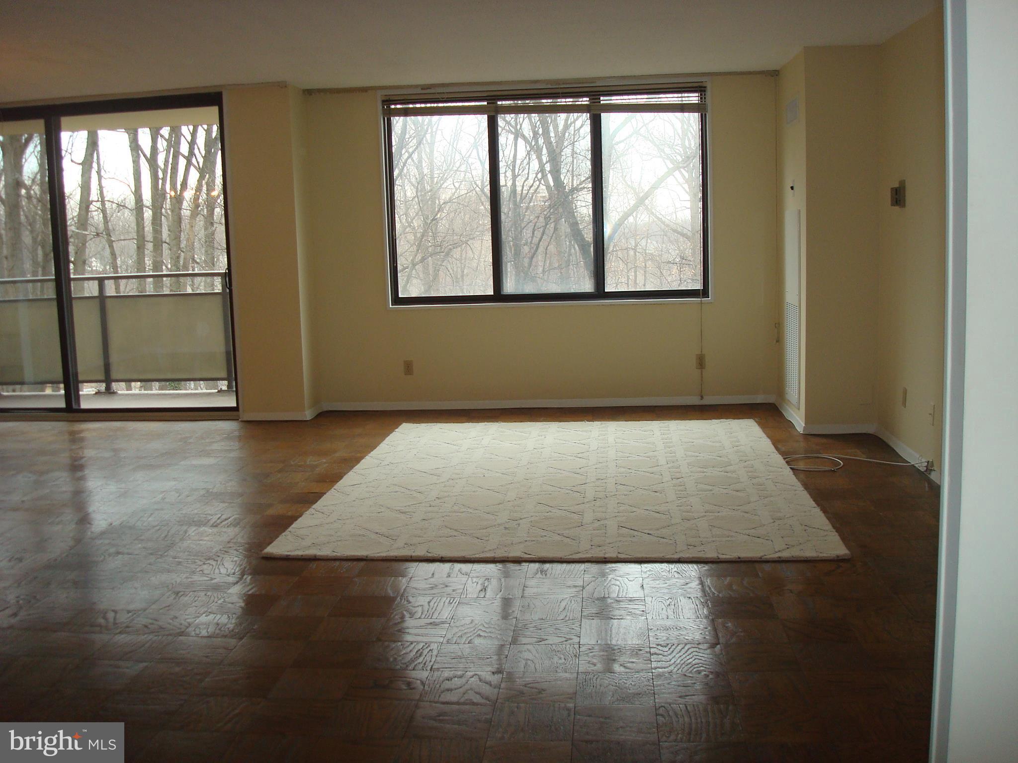5225 Pooks Hill Road, Unit 710N Bethesda, MD 20814 - Photo 2 of 28 Large living room with wood floors