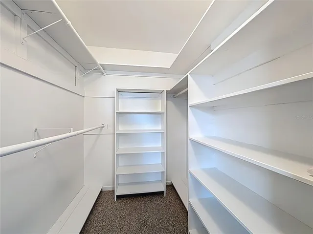 a view of an empty walk in closet