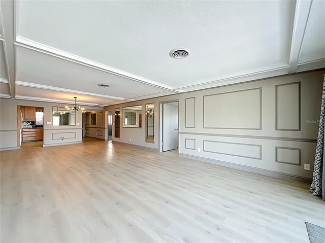 a view of an empty room and window