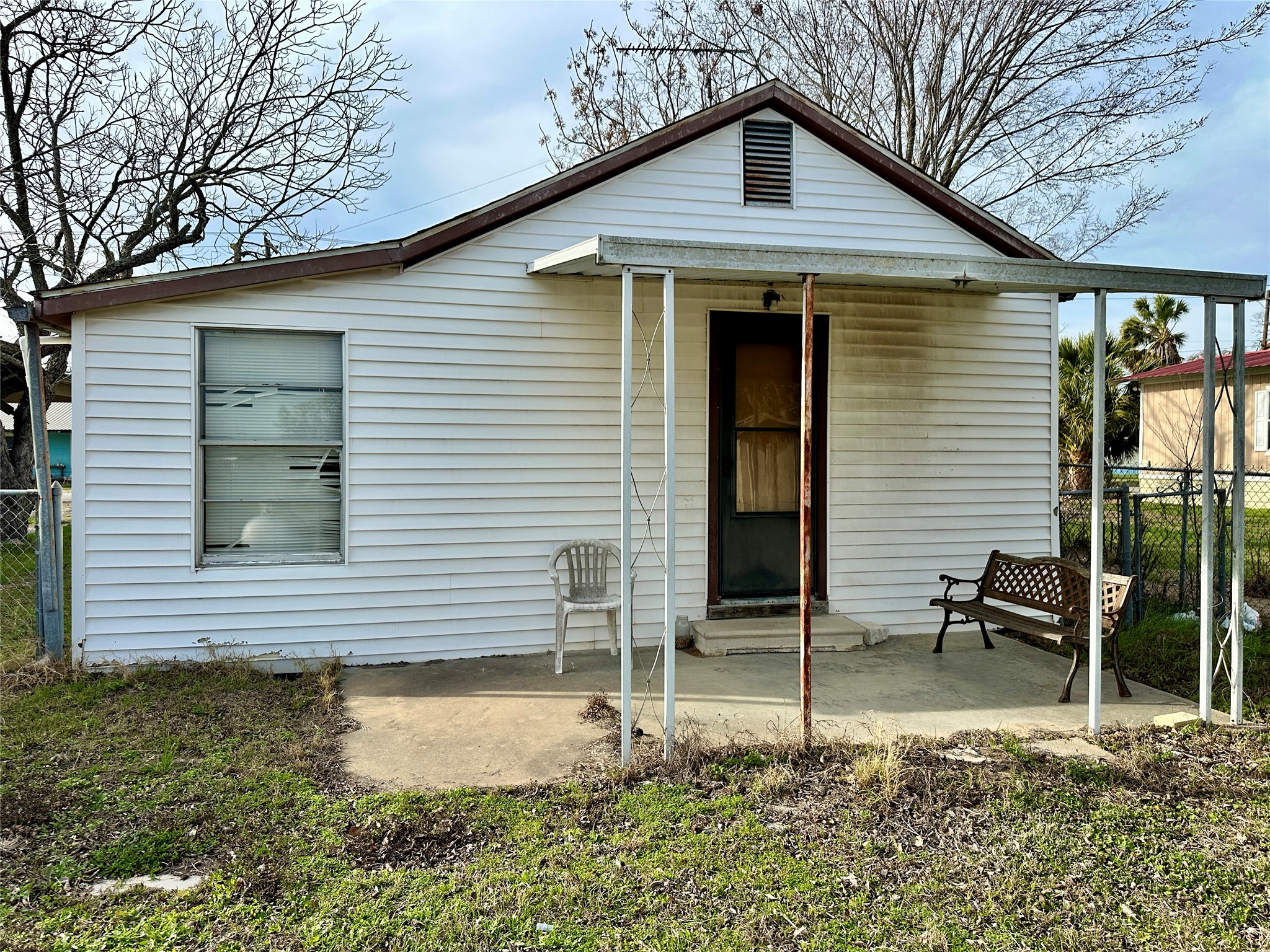 1148 Old Nails Creek Road Giddings, TX 78942 - Photo 15 of 23 a backyard of a house with table and chairs